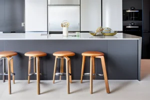 A large, seamless quartz kitchen island worktop with a subtle pattern, showcasing expert fabrication